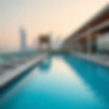 Inviting pool area of Baccarat Hotel Dubai with a view of the skyline